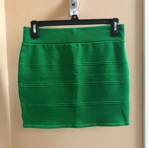 green mini skirt